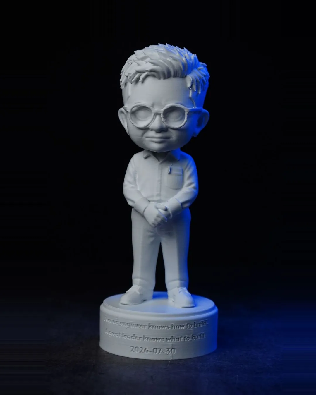 Chibi figure of a man with glasses, front view